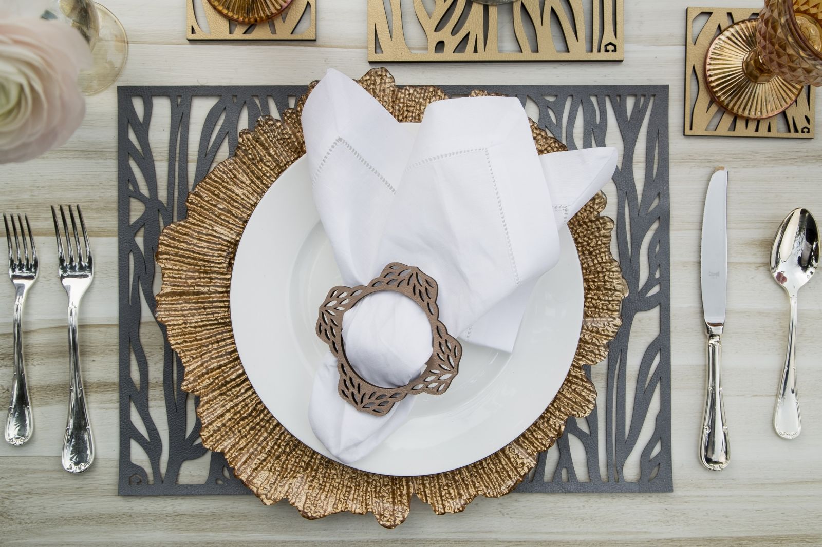 Dark Grey Placemat with abstract plant pattern on dinner table with plate on it