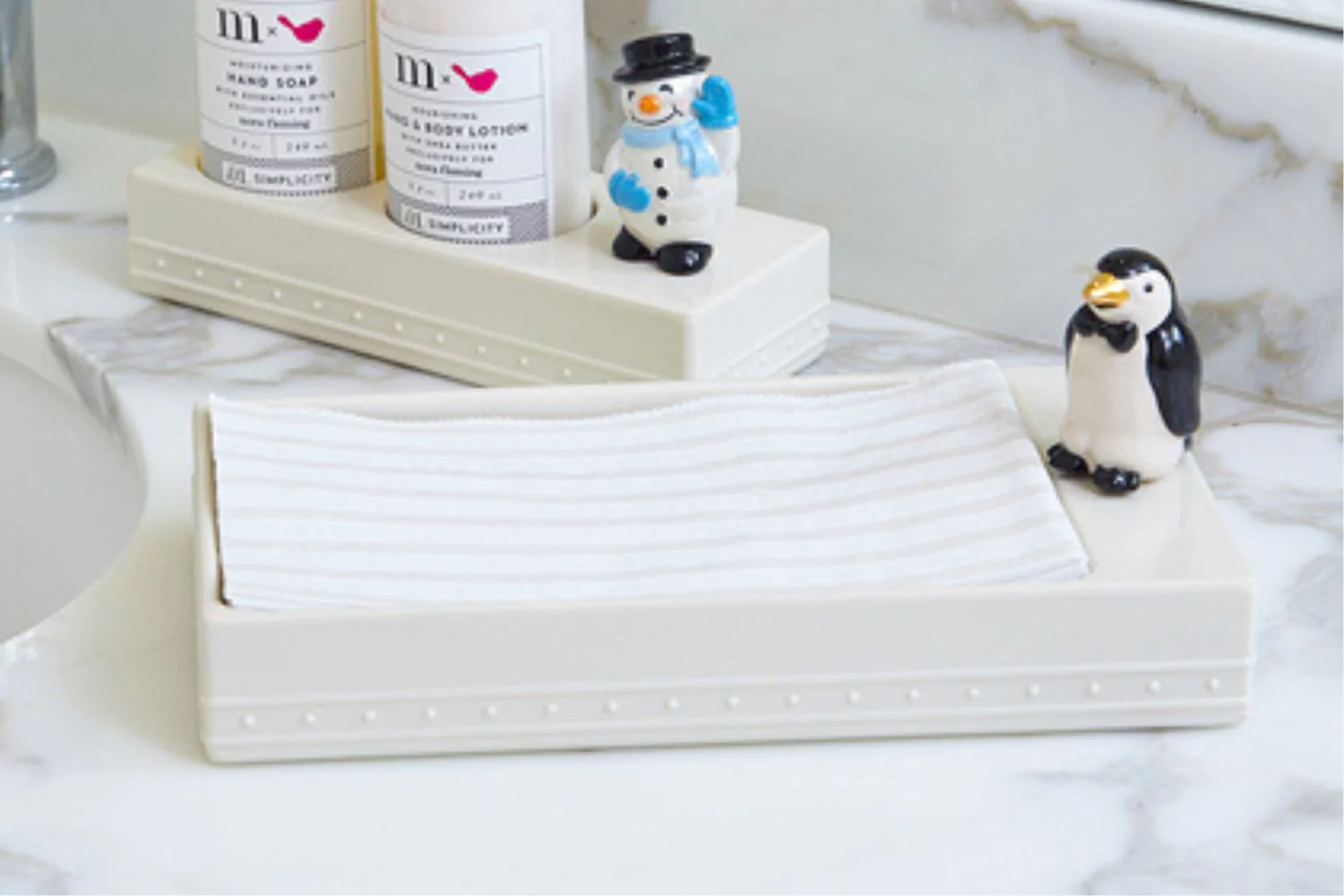 Nora Fleming Mini Tuxedo Penguin attached to a tray
