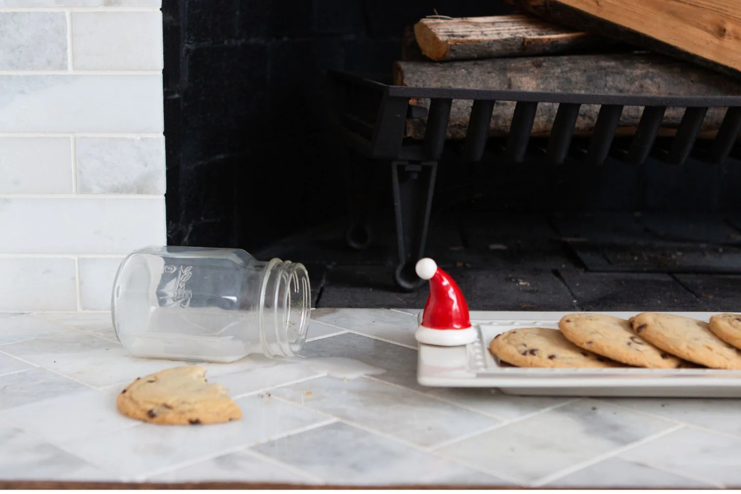 Nora Fleming Mini Santa hat attached to a platter of cookies