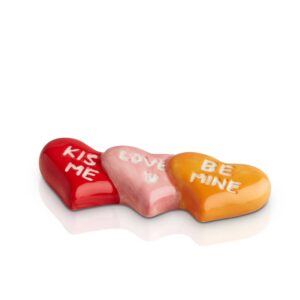 Nora Fleming Mini It's a love thing..., three hearts, the first says: Kiss Me, the second says: love you, the third says: be mine