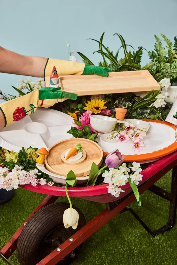 Wheelbarrow full of flowers, dishes and nora fleming minis